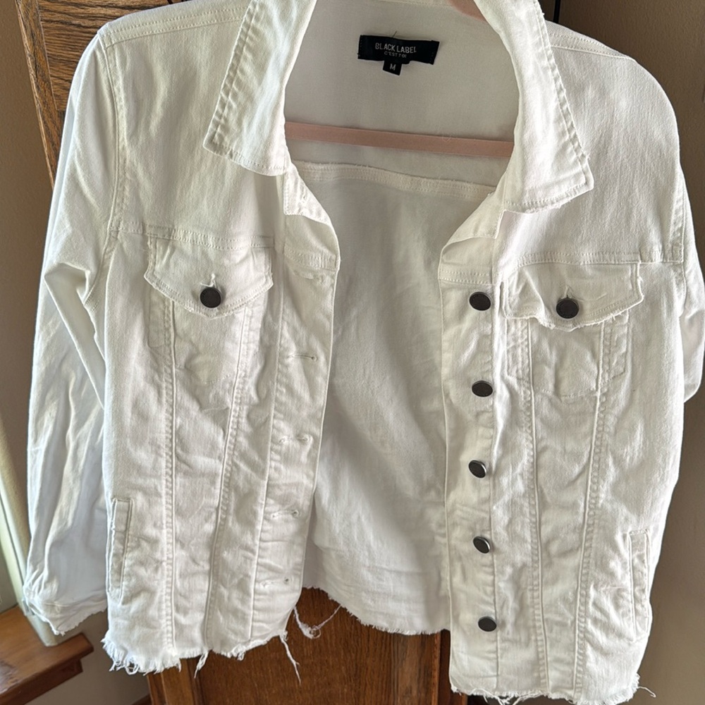 Black label, white jean jacket